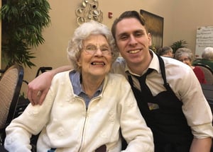 Generations Senior Living resident smiling with male employee