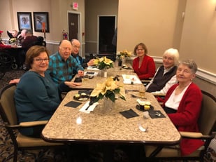 Seniors and Families Enjoying Christmas Dinner