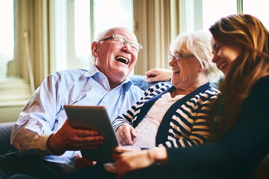 Visiting seniors in assisted living facility