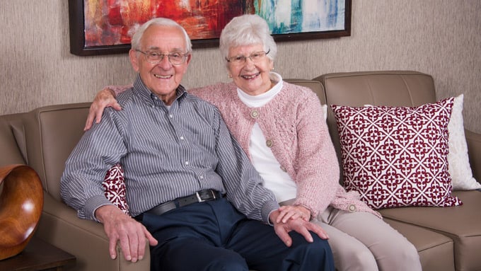 Elderly Couple Sitting on Couch