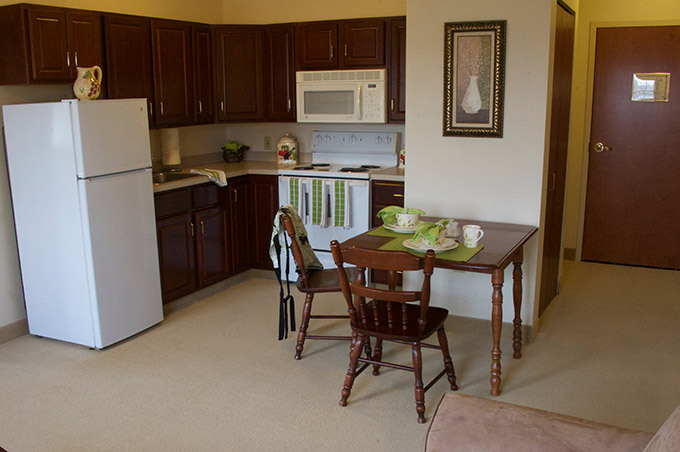 Kitchen of master one-bedroom senior living apartment