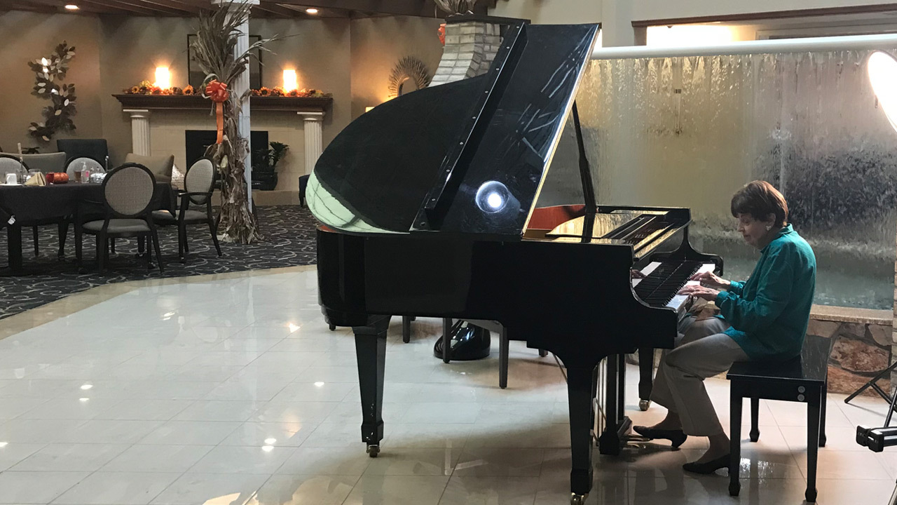 Playing piano in the lobby