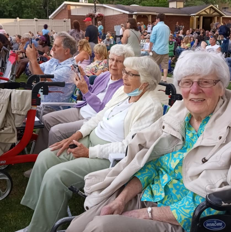 Senior women at a concert